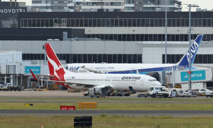 Самолёт компании Qantas в аэропорту Сиднея, Австралия, 18 января 2023 г. (Brendon Thorne/Getty Images)
