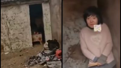 Мать восьмерых детей закована в хижине без дверей в городе Сюйчжоу, провинция Цзянсу, Китай, в январе 2022 года. (Screenshots via Douyin)
