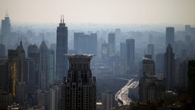Горизонт города перед ежегодным Всекитайским собранием народных представителей (ВСНП) в Шанхае, 24 февраля 2022 г. (Aly Song/Reuters)
