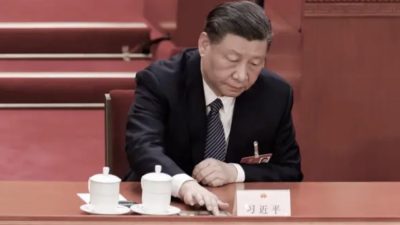 Лидер Китая Си Цзиньпин на пятом пленарном заседании Всекитайского собрания народных представителей в Пекине 12 марта 2023 года. (Lintao Zhang/Getty Images)