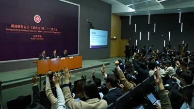 В январе 2024 года правительство Гонконга провело пресс-конференцию по поводу законопроекта о статье 23. (Cai Wenxin/The Epoch Times)