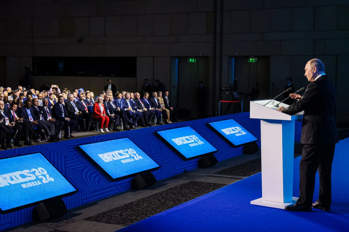 Президент России Владимир Путин выступает с речью на бизнес-форуме БРИКС в Москве 18 октября 2024 года. (Mikhail Metzel/Pool/AFP via Getty Images)