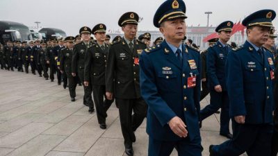 Делегаты от китайских военных перед заключительным заседанием Всекитайского собрания народных представителей в Пекине, 11 марта 2025 года. (Kevin Frayer/Getty Images)
