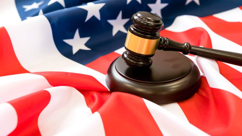 Тан Юаньцзюнь признал себя виновным в федеральном суде США в деятельности в качестве незарегистрированного агента Коммунистической партии Китая. (Yavdat via Shutterstock)