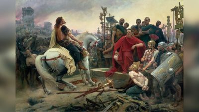 «Верцингеторикс бросает оружие к ногам Юлия Цезаря», 1899 год, автор Лионель Руайе. (Public Domain)