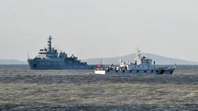 Китайские корабли патрулируют территорию во время военных учений на острове Пинтан — ближайшей к Тайваню точке — в восточной провинции Фуцзянь, Китай, 30 декабря 2025 года. (Adek Berry/AFP via Getty Images)