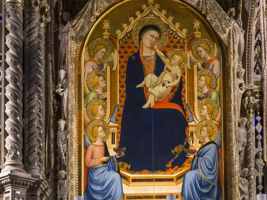 «Мадонна с младенцем» («Madonna delle Grazie») Бернардо Дадди заменила выцветшую фреску Девы Марии в 1347 году. Картина Дадди демонстрирует натурализм эпохи раннего Возрождения, изображённый во взаимодействии Девы Марии и Младенца. Вокруг портрета расположены скульптурные ангелы Орканьи, которые отдёргивают мраморную завесу или вуаль, а по бокам — витые колонны. (Isogood_patrick/Shutterstock)