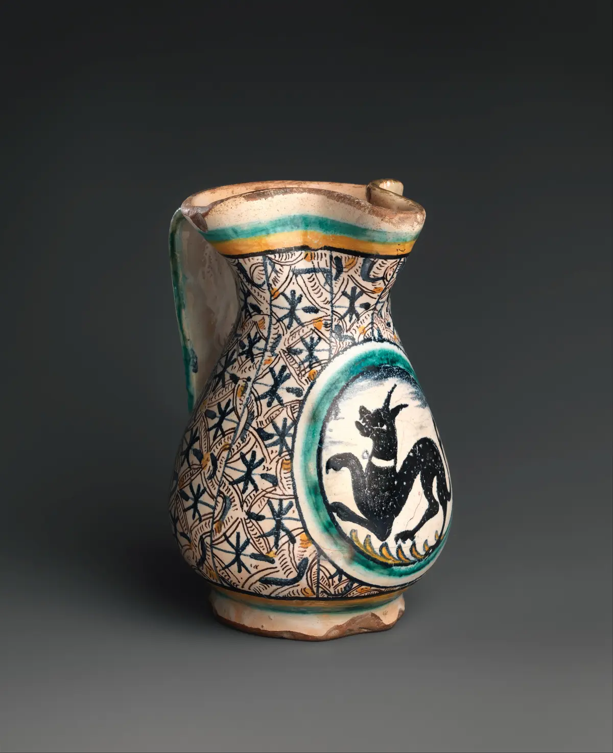 Итальянский кувшин, около 1480–1500 гг., из Флоренции или окрестностей (вероятно, Монтелупо). Фаянс с оловянной глазурью (майолика)